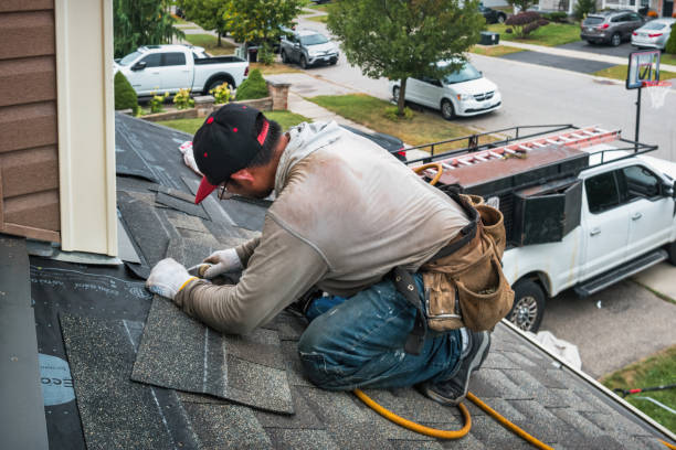 Professional Roofing technician working in Pittsford, NY